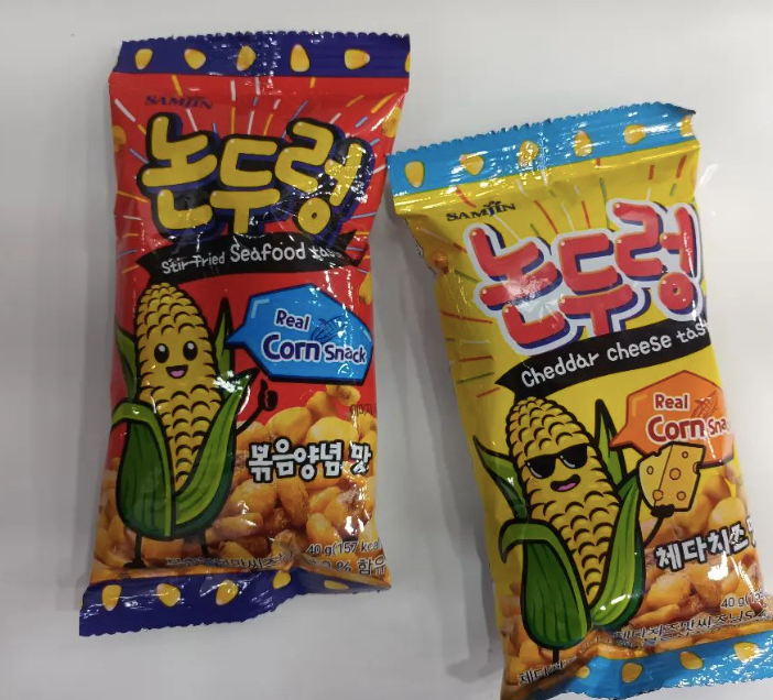 Two bags of corn chips, one stir-fried and one cheese-flavored